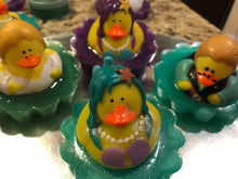 Rubber Duckies Swimming in Soap